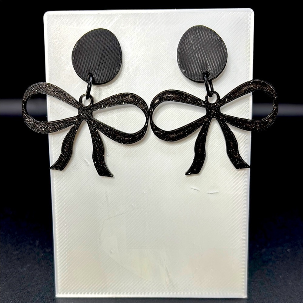 Elegant Black Glitter Bow Earrings - Picture 1 of 4